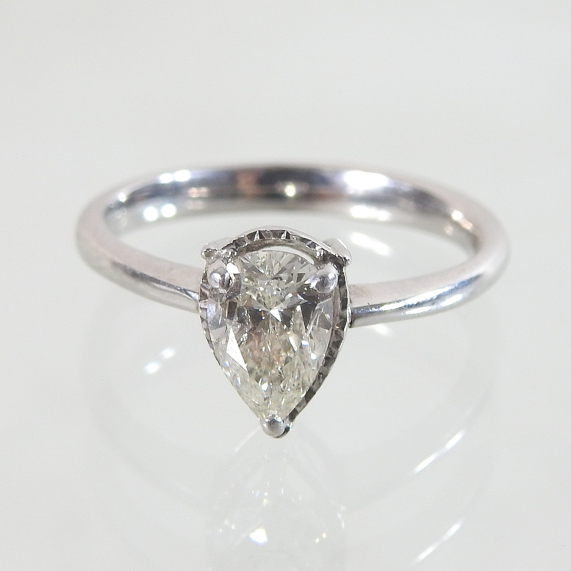 An 18 carat gold single stone ring,