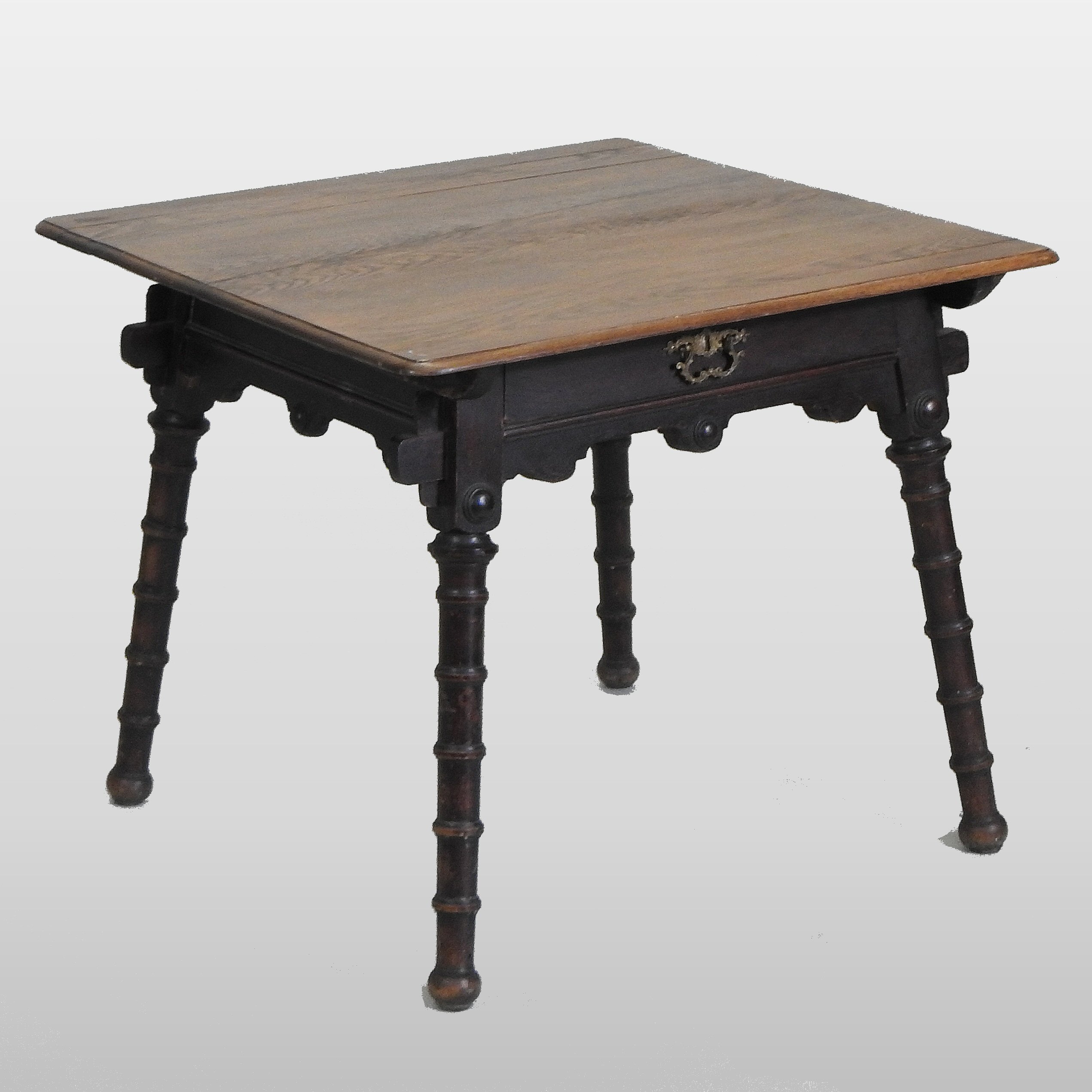 An Arts and Crafts oak centre table, in the manner of Morris & Co,