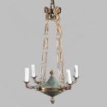 An Empire style brass four branch chandelier,