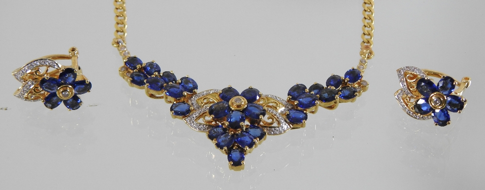 An 18 carat gold sapphire and diamond necklace and earring set, - Image 5 of 7
