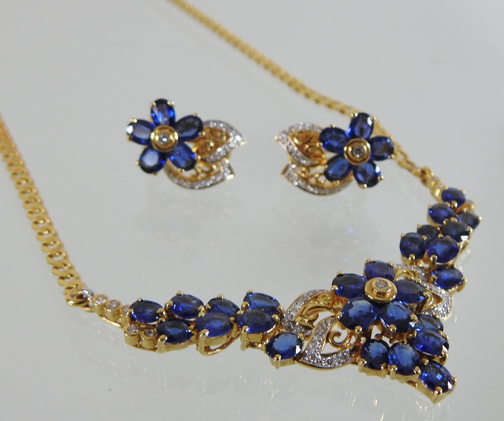An 18 carat gold sapphire and diamond necklace and earring set, - Image 6 of 7