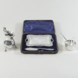 An Edwardian silver butter dish, with a glass liner and knife, Birmingham 1903, cased,