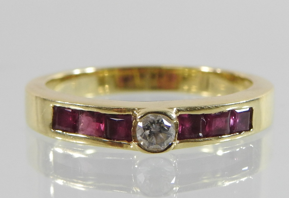 An 18 carat gold diamond ring, with channel set ruby shoulders, - Image 4 of 4