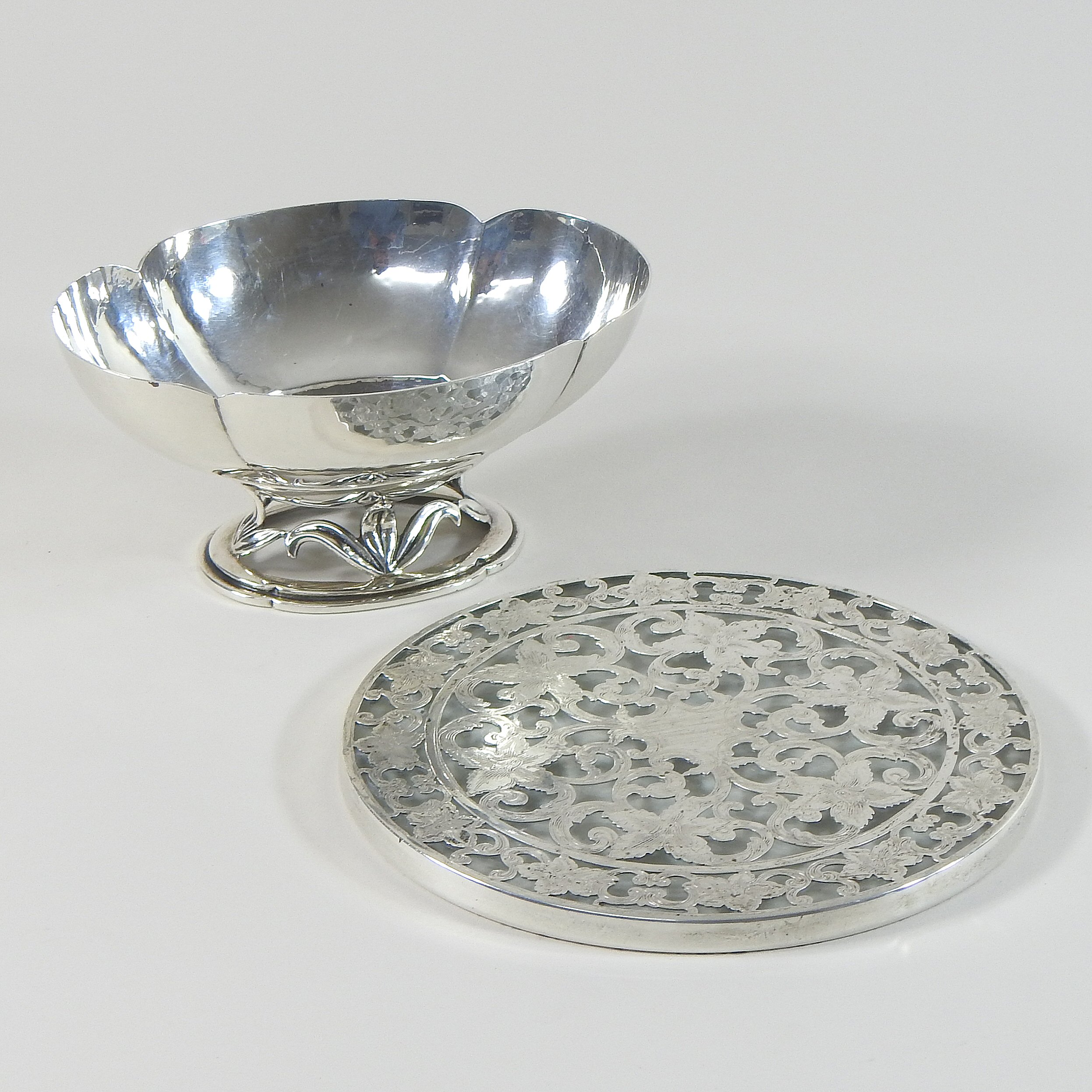 An early 20th century American sterling silver bon-bon dish, of quatrefoil pedestal shape,