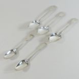 A collection of five 19th century silver spoons, to include a pair of fiddle pattern table spoons,