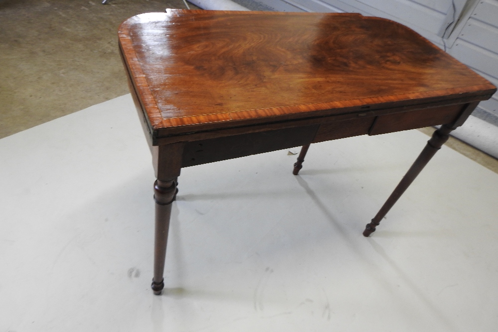 A George III mahogany and satinwood crossbanded folding card table, with a hinged breakfront top, - Image 2 of 7