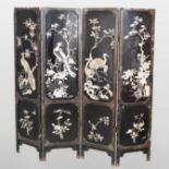 A Japanese four fold Shibayama dressing screen, decorated with flora and fauna,