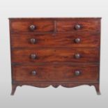 A George III mahogany chest, containing two short over three long graduated drawers,
