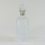 An early 20th century cut glass decanter, with a silver collar, Birmingham 1931,