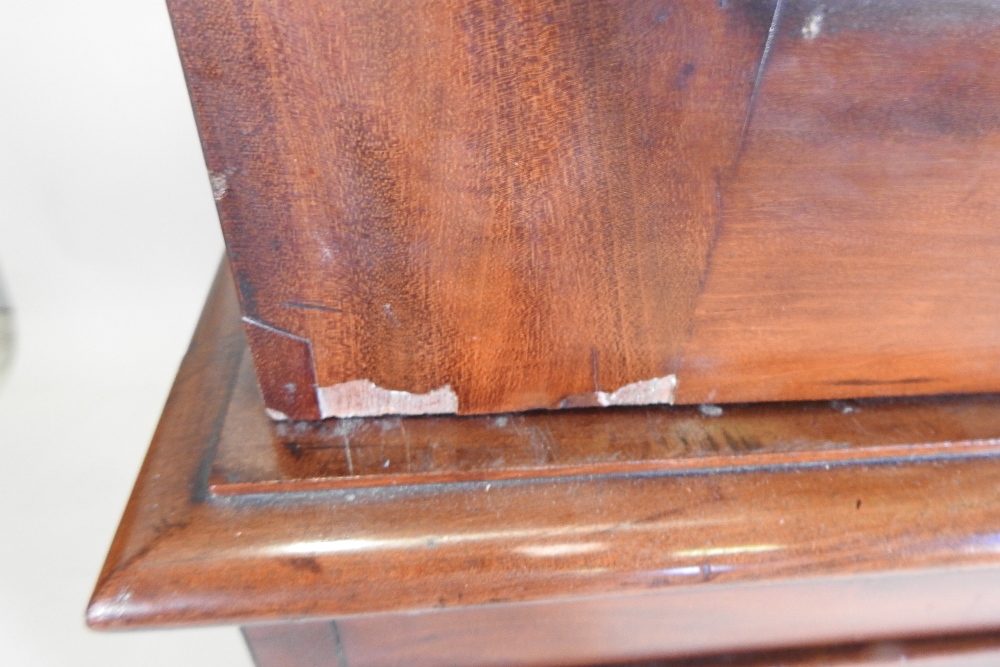 A 19th century mahogany linen press, fitted with slides, standing on a plinth base, - Image 5 of 12