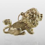 A 9 carat gold pendant, in the form of a lion, 3.