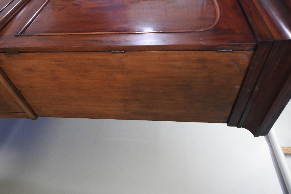 A 19th century mahogany linen press, fitted with slides, standing on a plinth base, - Image 9 of 12