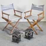 A pair of folding director's chairs, together with a pair of iron lanterns,