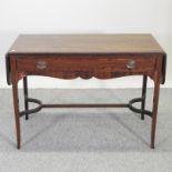 An American mahogany drop leaf side table, containing two drawers,