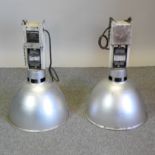 A pair of industrial ceiling lights,