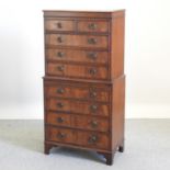 A George III style mahogany chest on chest, with a brushing slide,