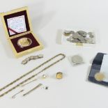 A collection of jewellery and coins, to include necklaces and cased commemorative coins,