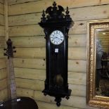 A 19th century ebonised Vienna style wall clock, with a single weight movement,