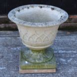 A Gothic style reconstituted stone pedestal planter,