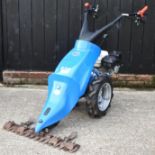 A BCS 620 brush cutter,