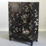 A Chinese lacquered cabinet, with hardstone decoration,