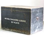 An early 20th century Masonic painted pine box, with a hinged lid, inscribed Needlemaker's Lodge,