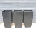 A set of three black garden pots,