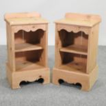 A pair of pine bedside cabinets,