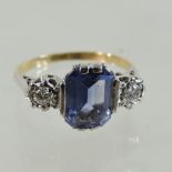 An unmarked gem set ring,