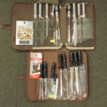 A chef's nine piece knife set, cased,