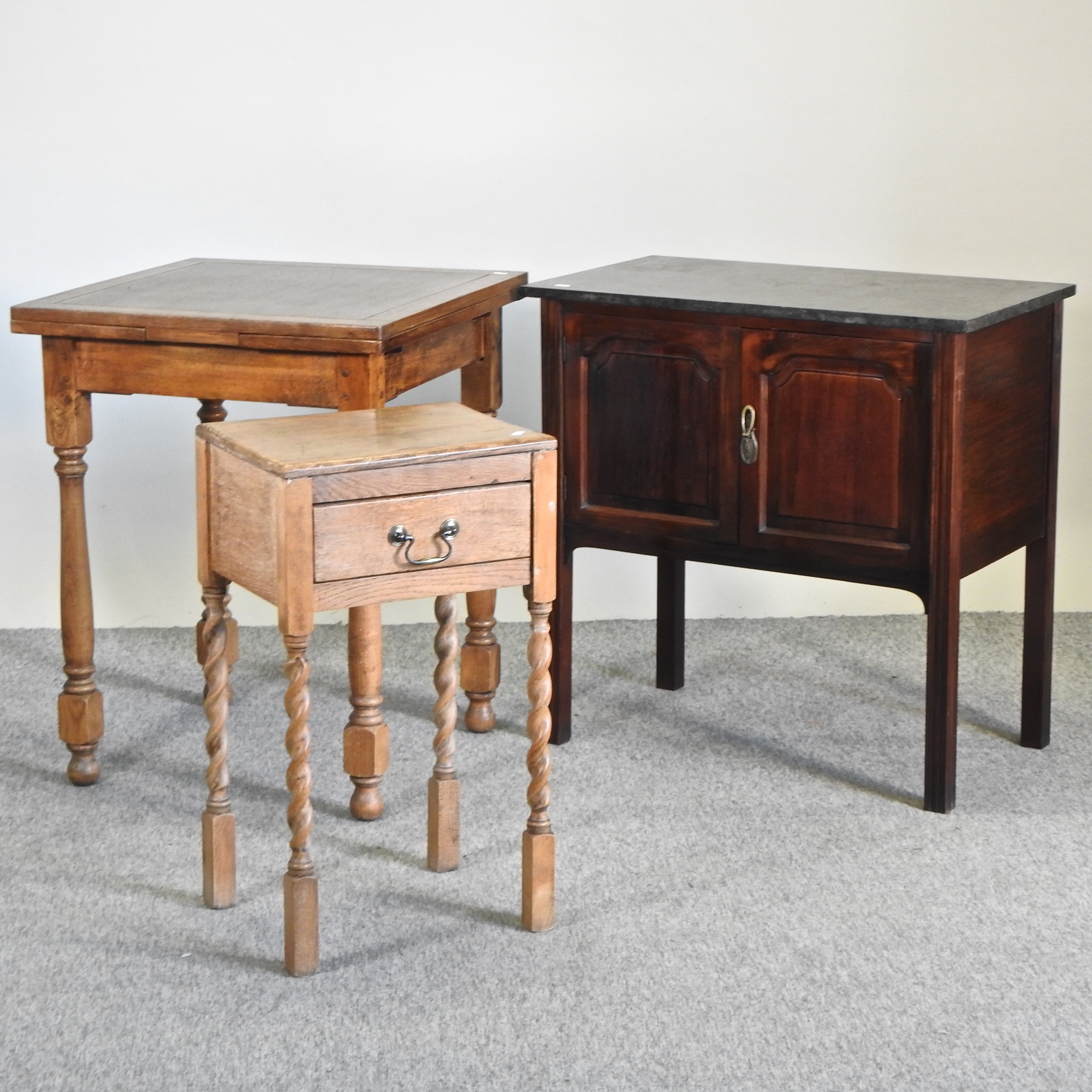 A 1920's mahogany cabinet with a marble top, 76cm,