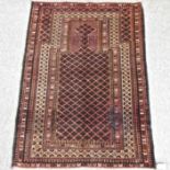 An Afghan prayer rug, with all over medallions, on a red ground,