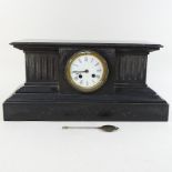 A Victorian black slate mantel clock,