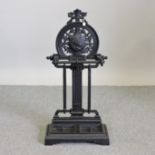 A Victorian style cast iron umbrella stand,