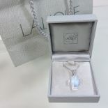 A Lalique opalescent glass cross pendant necklace,