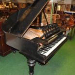 A 19th century ebonised cased baby grand piano, on octagonal turned legs, by Robert Westphall,