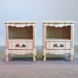 A pair of white painted bedside cabinets, each with a single drawer below,