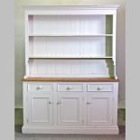 A white painted pine dresser,