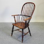 A 19th century elm Windsor armchair,