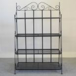 A black painted metal folding garden shelf,