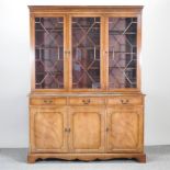 A George III style mahogany astragal glazed cabinet bookcase,