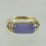 A 14 carat gold lavender jade and diamond set ring,