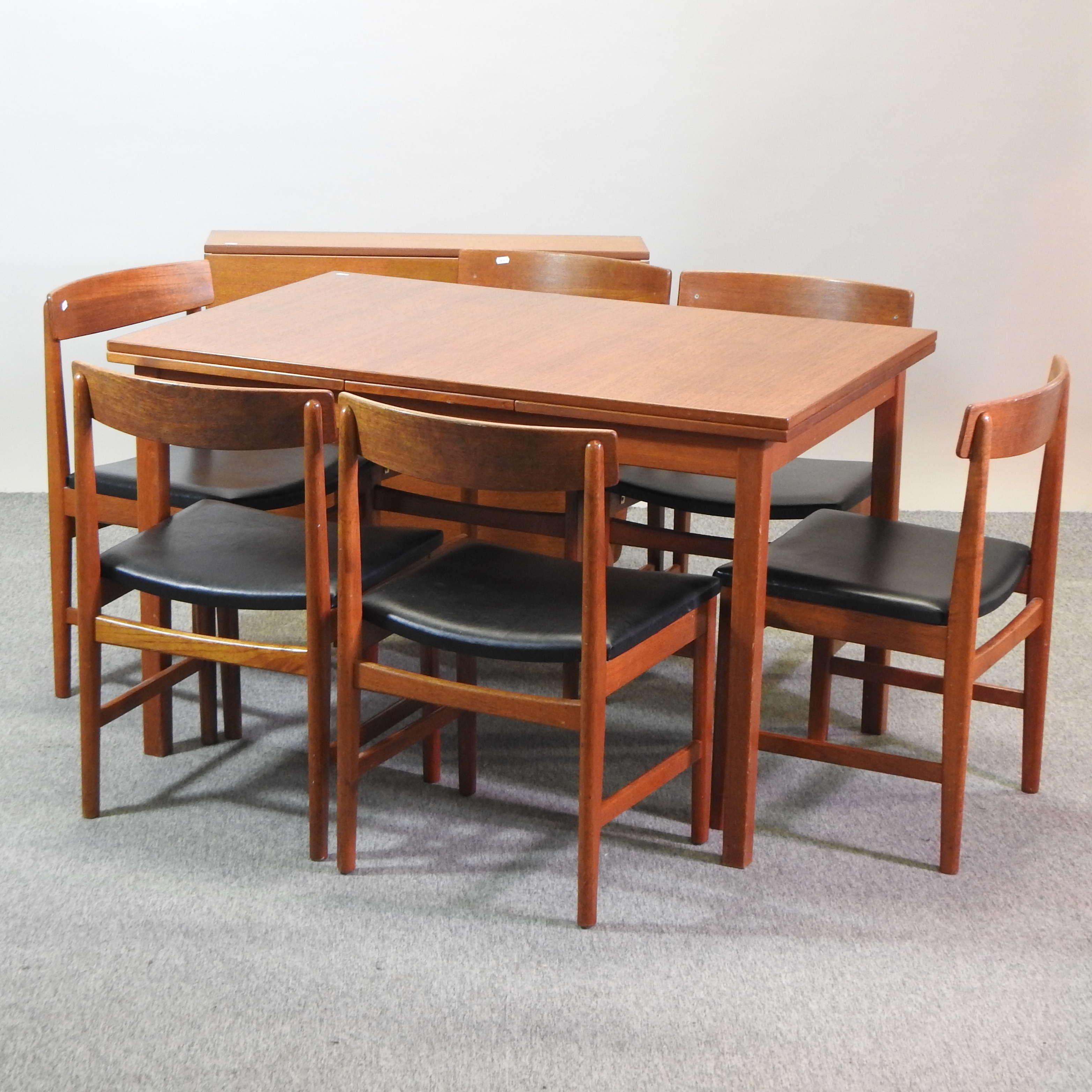 A 1970's teak dining table, 120 x 80cm,