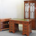 A reproduction yew wood twin pedestal desk, with a green leather inset top, 112cm,