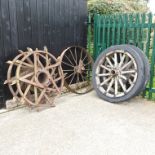 A pair of iron spiked tractor wheels, 125cm diameter,