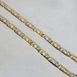 An unmarked yellow and white metal curb link necklace, tests as 18ct,