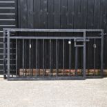 A pair of large iron gates, 117 x 180cm,