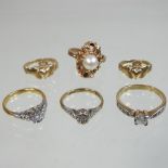 A collection of six various gold rings,