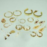 A collection of various earrings,