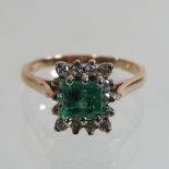 A 14 carat gold emerald and diamond square set cluster ring,